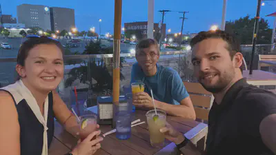 Elizabeth (left), Connor (center), and Tony (right) shared a dinner in Tulsa upon arrival, which may have included frozen libations, to prepare for the coming days of the meeting.